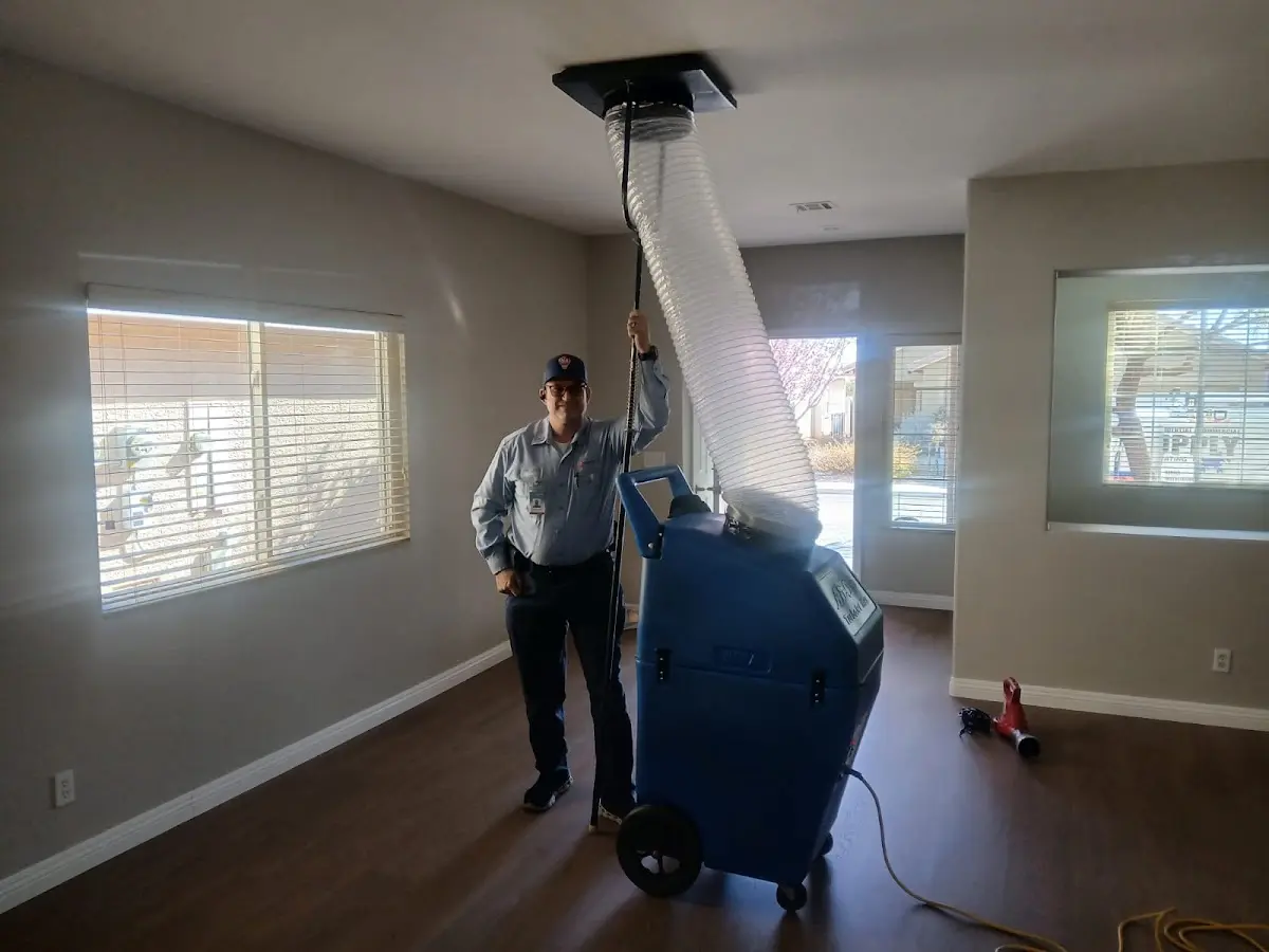 Professional Dryer Vent Cleaning work inside a Aztec home